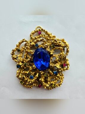 Vintage Abstract Gold-Tone Metal Flower Pendant w/ Large Blue Rhinestone